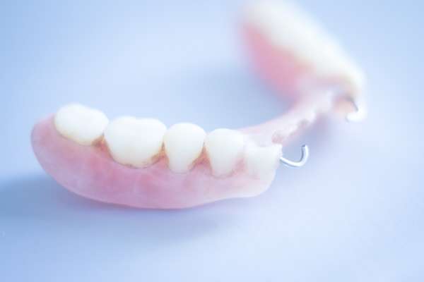 Should I Get Dentures or Dental Implants from GK Dental PC in Everett, MA